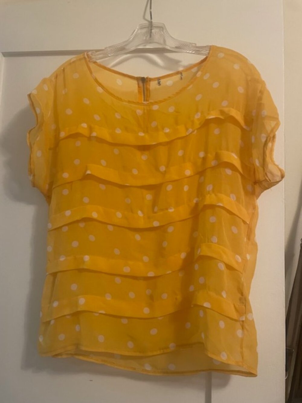 Yellow short-sleeved polka-dot top